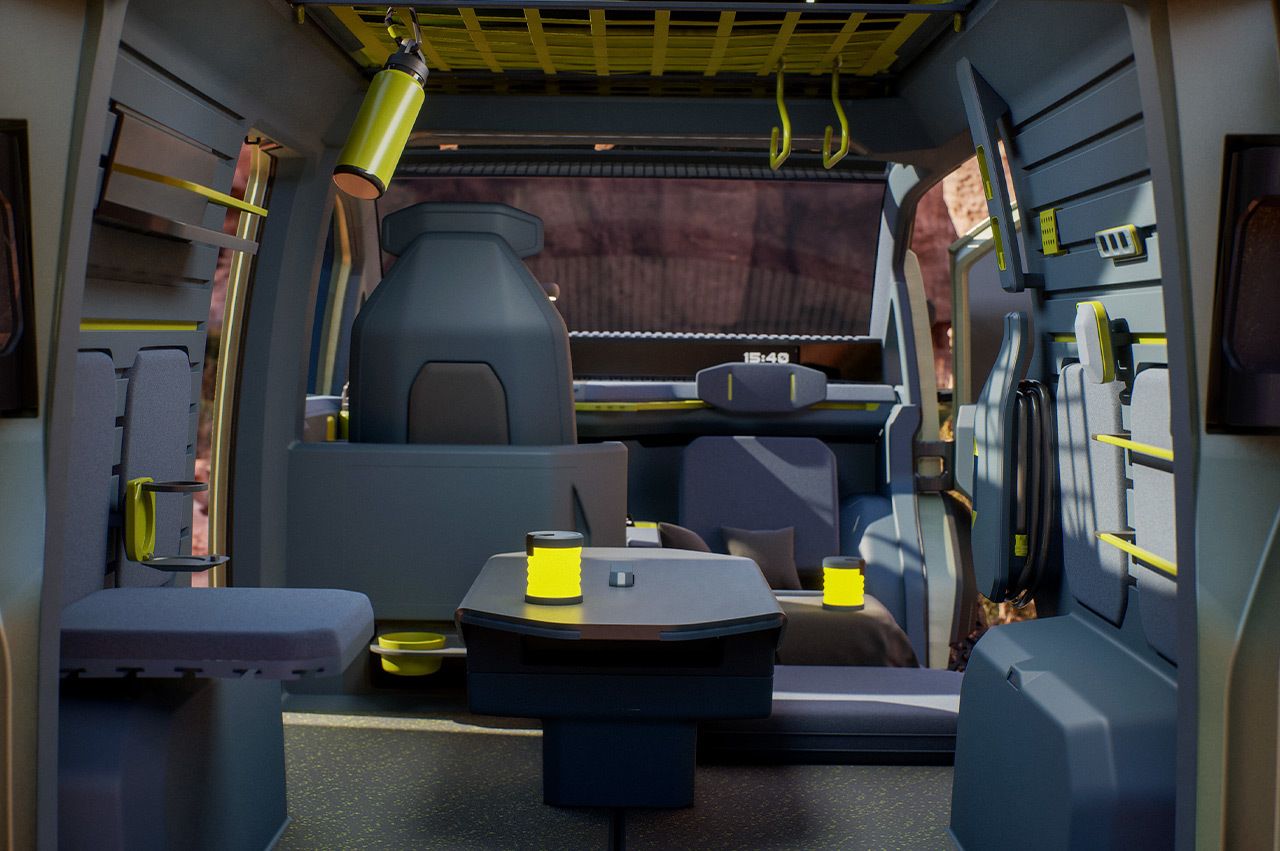 Kia "WKNDR" concept EV, full-view of the flexible interior space organized to accommodate seating around a small table in the middle