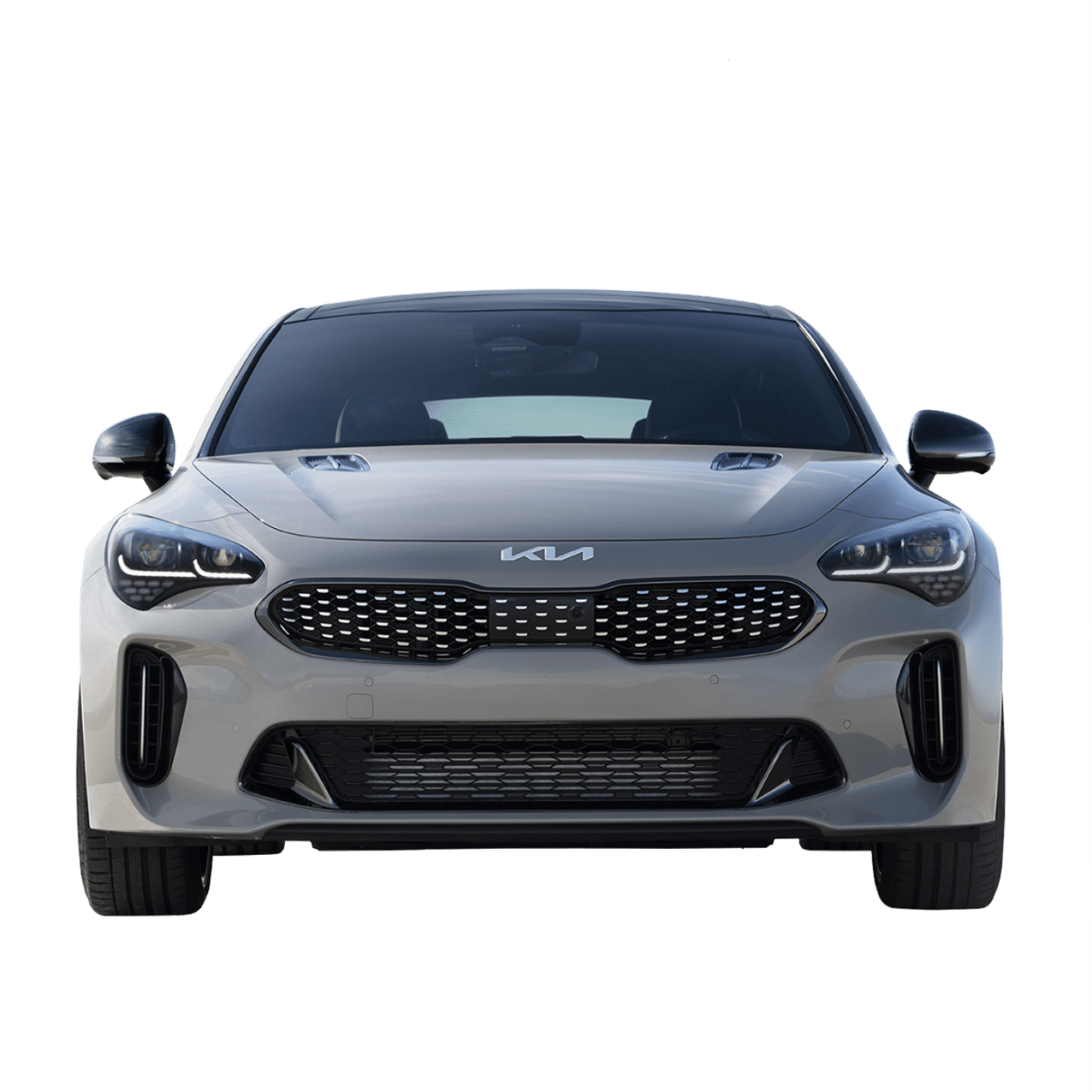 The front of a Kia sedan highlighting its grille and front styling.